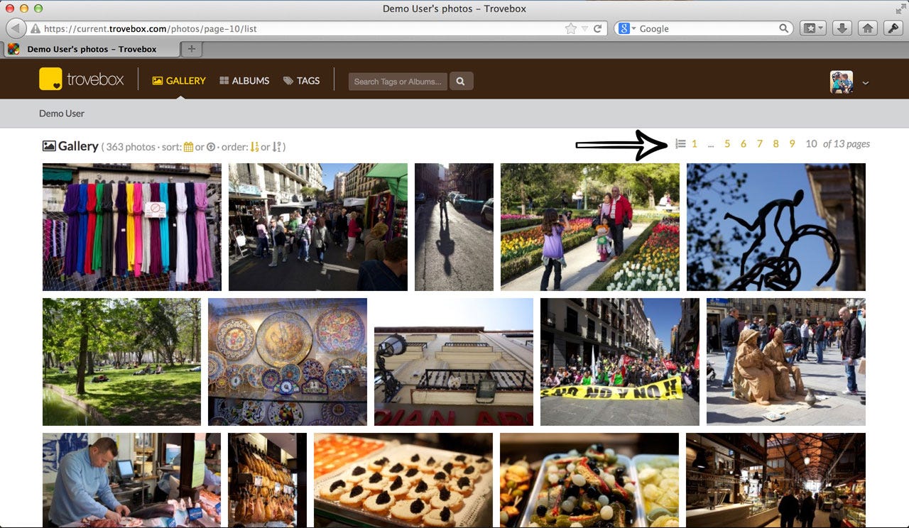 The Trovebox photo gallery in a browser window, a grid of photo thumbnails with an arrow pointing to the numbered pagination controls above it.